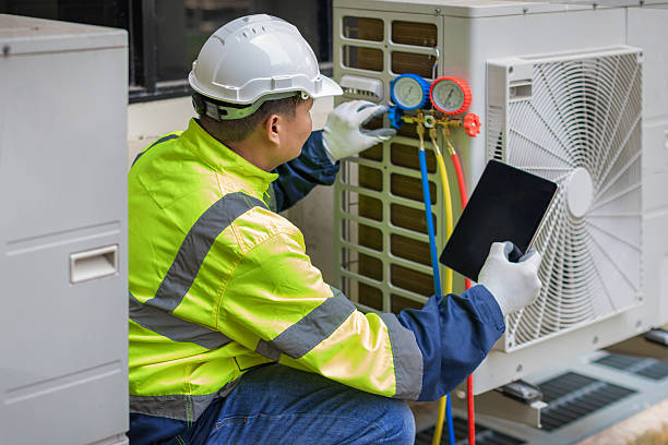 Professional Heat Pump Repair technician working in Bethpage, NY
